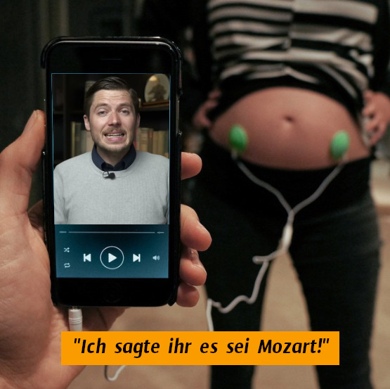 Boris Video läuft über Kopfhörer auf schwangeren Bauch